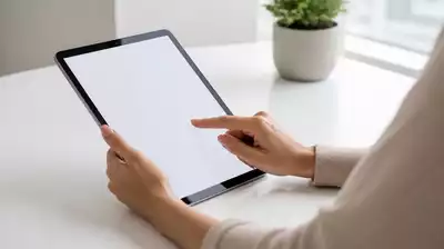 User submitting online form on tablet