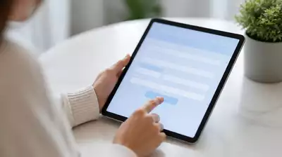 User submitting online form on tablet